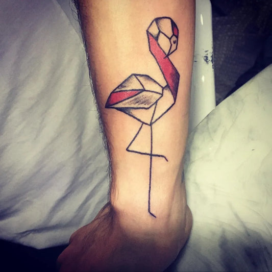Small Geometric Flamingo Tattoo on Men Leg by @tatt2spook