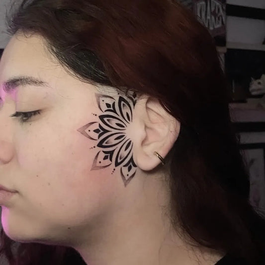 Small Geometric Mandala on Women Face Tattoo by @tatuajes_vas