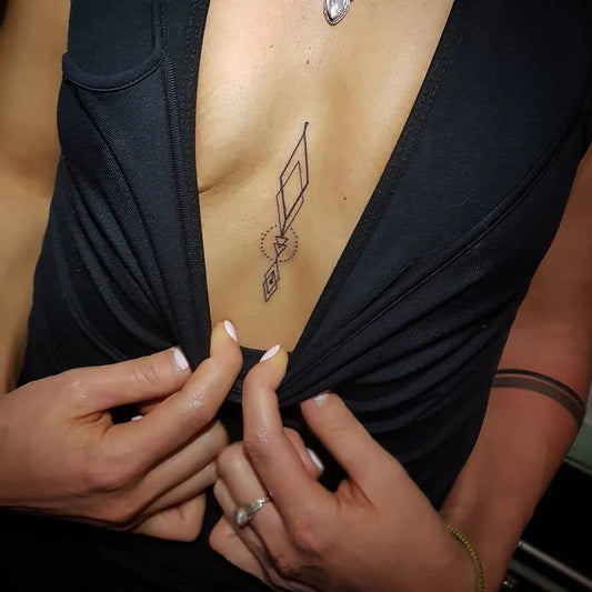 Small Geometric Mandala on Women Sternum Tattoo by @dotworxtattoo