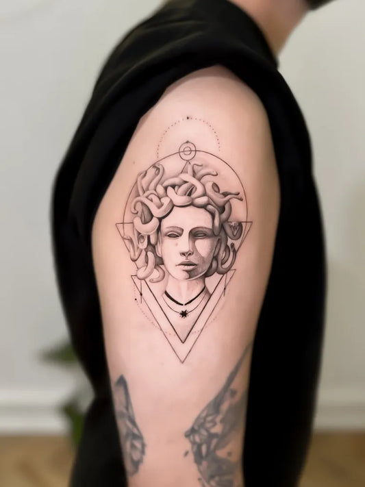 Small Geometric Medusa Head with Snakes on Men Upper Arm Tattoo by @flowtatts