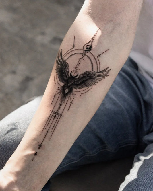 Small Geometric Phoenix Eye Wings on Women Arm Tattoo by @didemrs