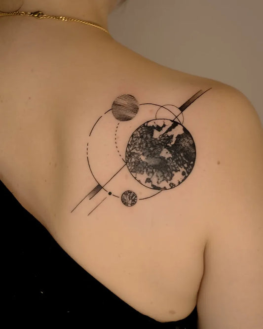 Small Geometric Planets and Orbits on Women Shoulder Tattoo by @mashatattoo