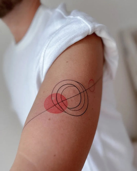 Small Geometric Red Yin Yang Circles Tattoo on Men Arm by @erin_heartless_tattoo