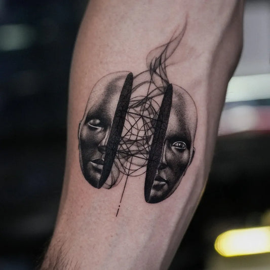 Small Geometric Split Faces with Smoke on Men Arm Tattoo by @aj_tats