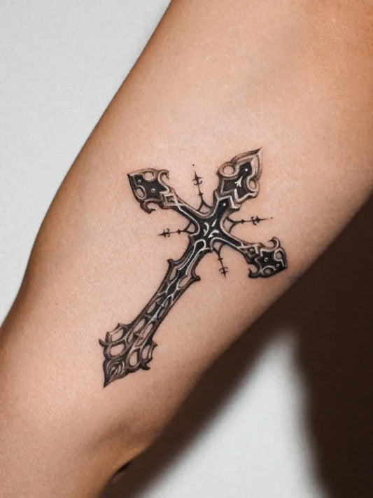 Small Gothic Cross on Women Arm Tattoo by @blanco_tattoo_