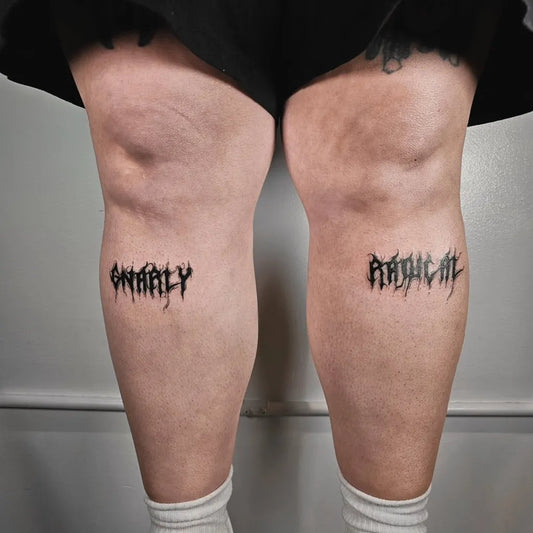 Small Gothic Word Tattoo on Women Thighs by @iantattoonyc