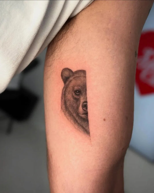 Small Half Bear on Men Arm Tattoo by @samuelford.tattoo