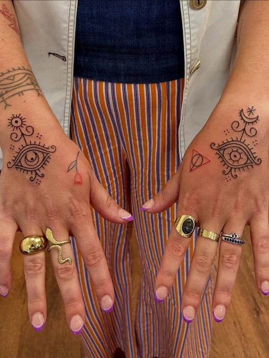 Small Henna Eyes and Symbols on Women Hands Tattoo by @inkd.by_c
