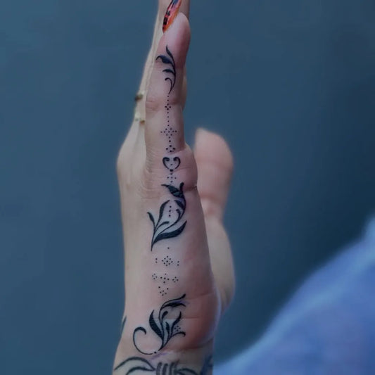 Small Henna Floral Vine on Women Hand Tattoo by @akinkforink