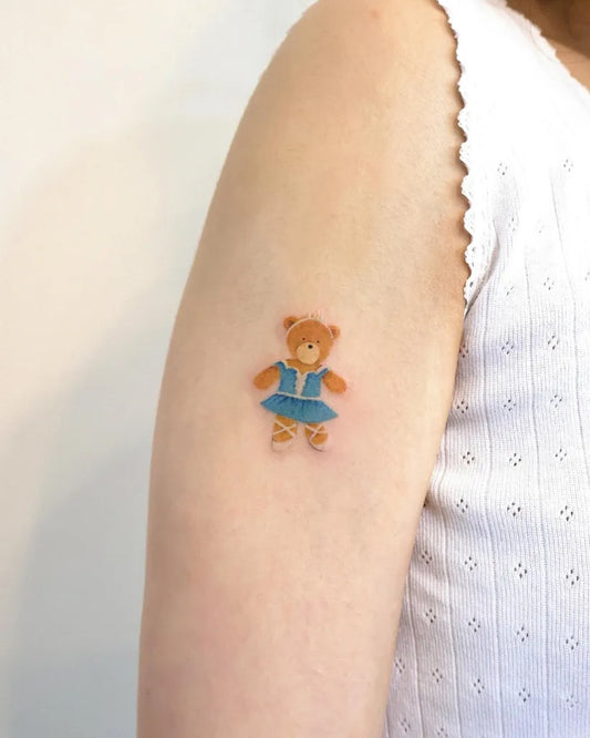 Small Illustrative Ballerina Bear on Women Arm Tattoo by @aol.tattoo