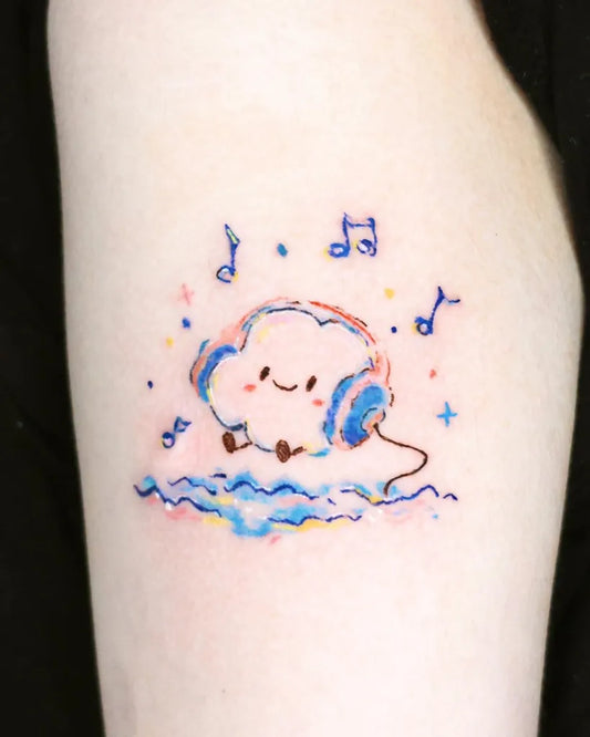 Small Illustrative Cloud with Headphones Tattoo on Women Arm by @dahlia_tattooist