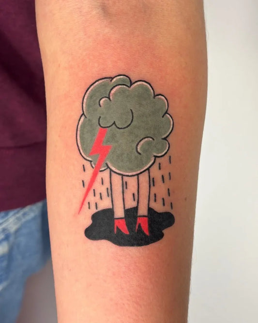 Small Illustrative Cloud with Lightning and Heels Tattoo on Women Arm by @mama.mahluk.tattoo