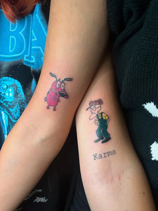 Small Illustrative Courage Karma Cartoon Tattoo on Women Arm by @mamaietattoo