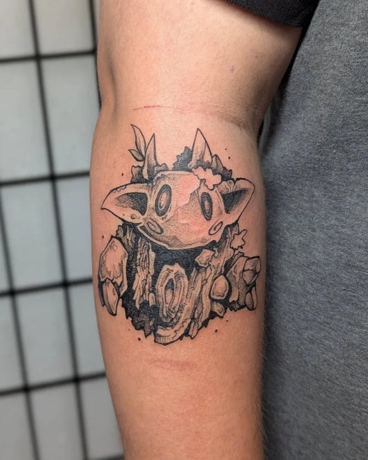 Small Illustrative Cute Creature with Flowers Tattoo on Women Arm by @wicktail