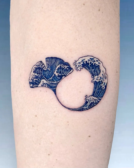 Small Illustrative Fish and Wave Tattoo on Women Arm by @c.i.e.l_tt