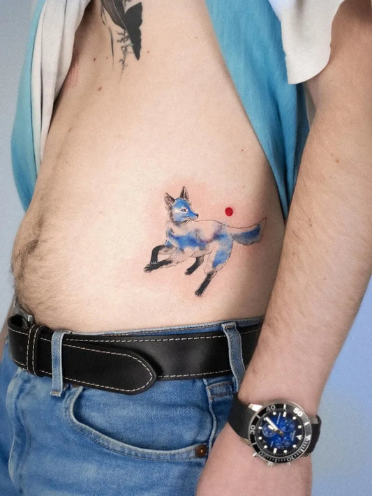 Small Illustrative Fox Tattoo on Men Side by @indigo.yh