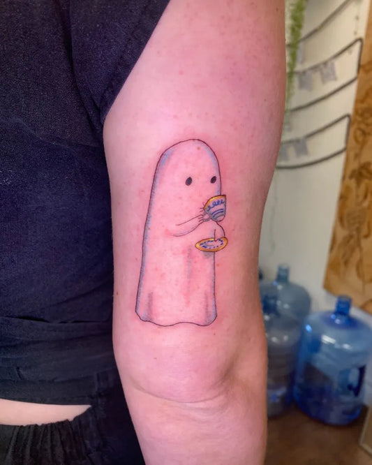 Small Illustrative Ghost with Tea Tattoo on Women Arm by @axelhoney
