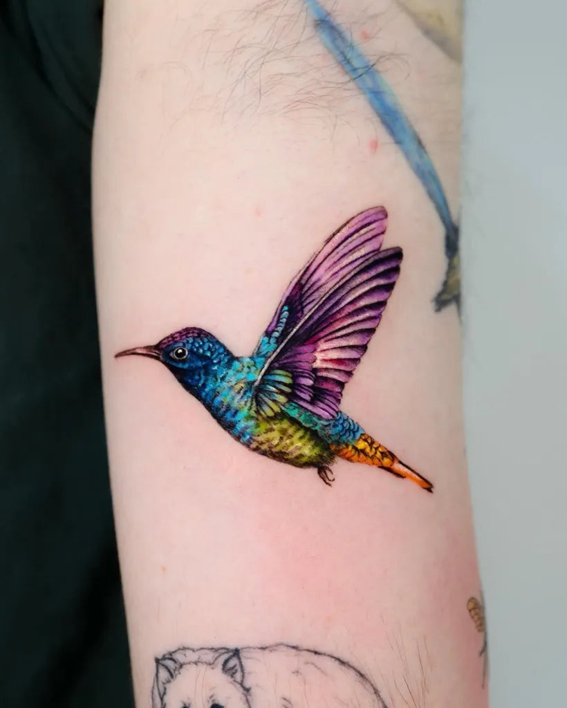 Small Illustrative Hummingbird Tattoo on Women Arm by @_rony_tattoo