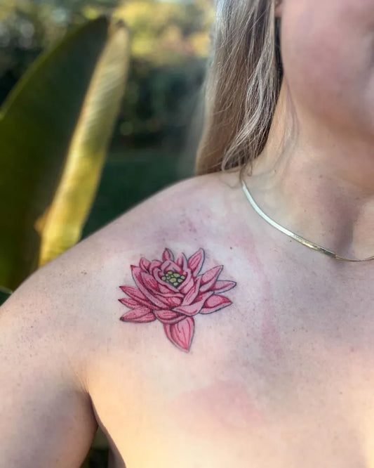 Small Illustrative Lotus Flower on Women Shoulder Tattoo by @ironpalmtattoos
