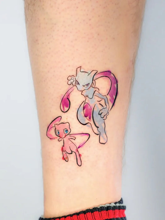 Small Illustrative Mew and Pink Pichu Tattoo on Women Leg by @gil_miguel_tattoo_