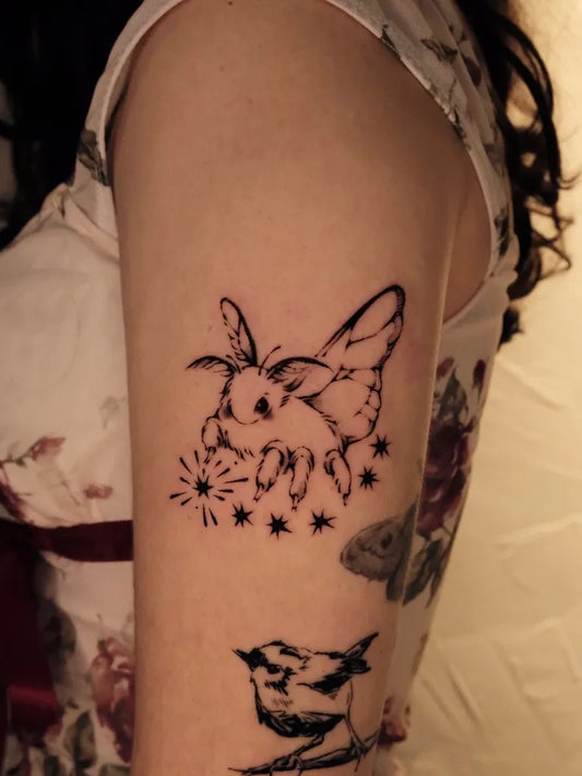Small Illustrative Moth and Bird Tattoo on Women Arm by @sleepywoode