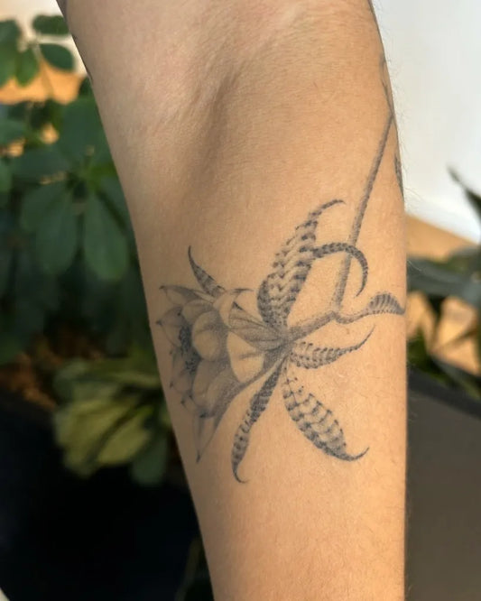 Small Illustrative Orchid Tattoo on Women Arm by @charles.mackerel