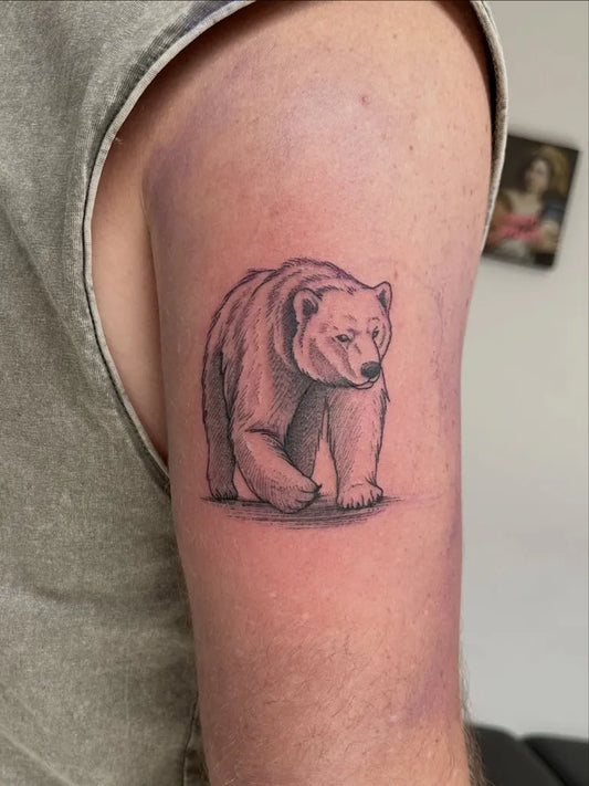 Small Illustrative Polar Bear Tattoo on Men Upper Arm by @andythevandal