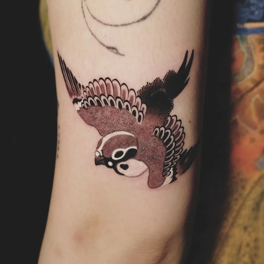 Small Illustrative Sparrow Tattoo on Women Arm by @jaya__tattoo