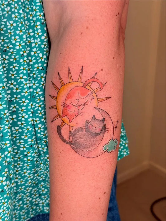 Small Illustrative Sun Moon Cats on Women Arm Tattoo by @raissa.ink