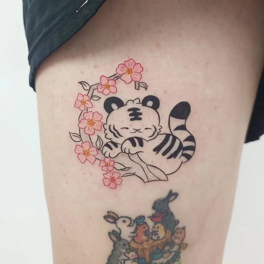 Small Illustrative Tiger and Cherry Blossom on Women Thigh Tattoo by @rufflemyink