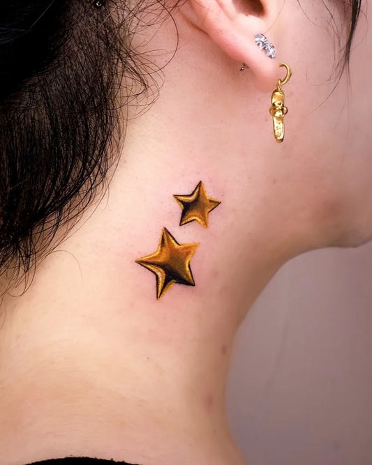 Small Illustrative Two Shiny Golden Stars Tattoo on Women Neck by @yanyee.tattoo