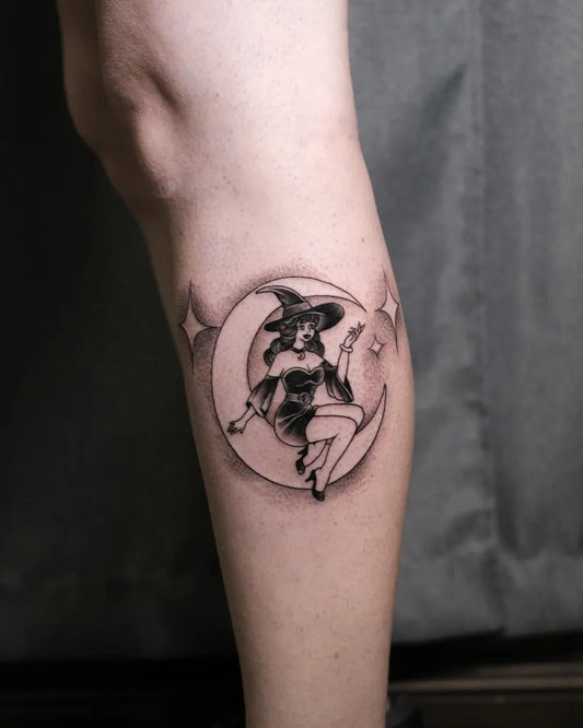 Small Illustrative Witch and Crescent Moon Tattoo on Women Thigh by @dannytattoos