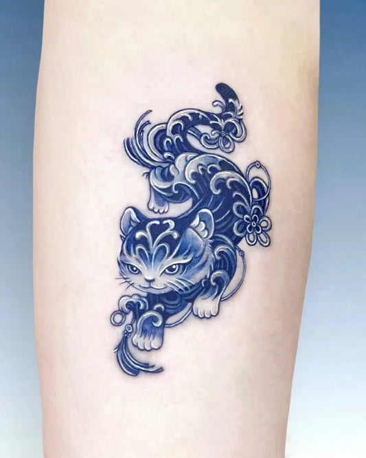 Small Irezumi Wave Cat Tattoo on Women Arm by @c.i.e.l_tt