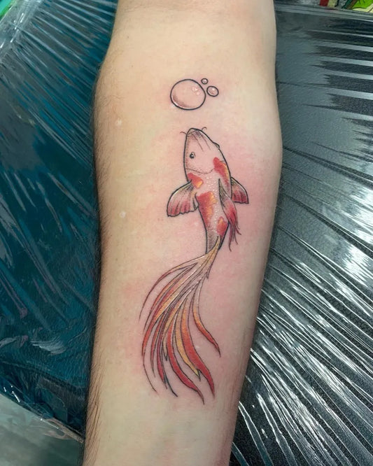 Small Japanese Koi Fish on Men Arm Tattoo by @moxietattoo