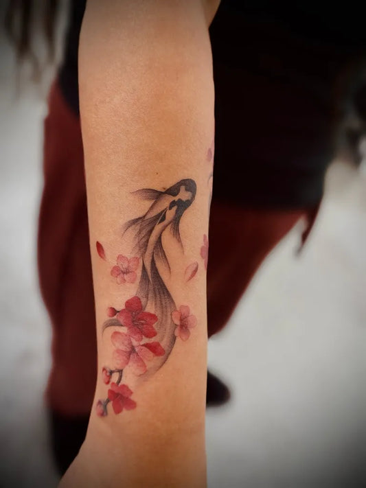 Small Japanese Koi and Cherry Blossom on Women Forearm Tattoo by @minaa.ink