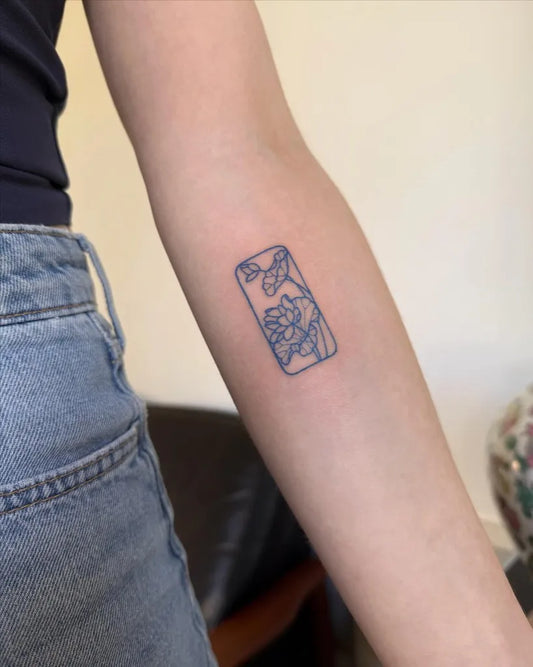 Small Japanese Rectangular Frame with Flowers on Women Upper Arm Tattoo by @dartkatt
