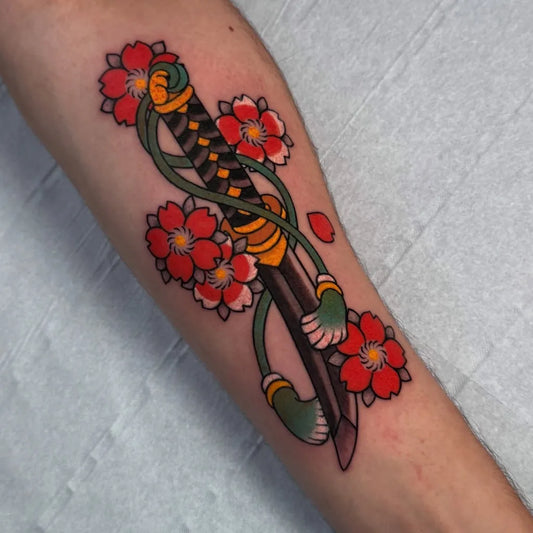 Small Japanese Sword and Cherry Blossoms on Men Arm Tattoo by @sarudany