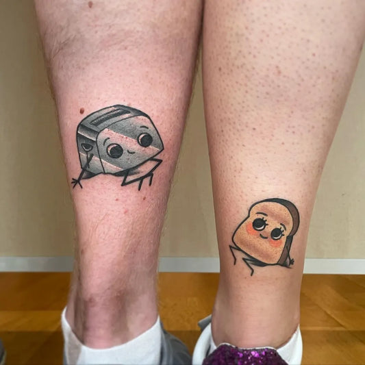 Small Kawaii Toast and Toaster on Women Legs Tattoo by @gigitattoos