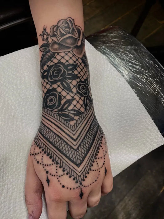 Small Lace Rose and Mandala on Women Wrist Tattoo by @misfits_tattoo_collective