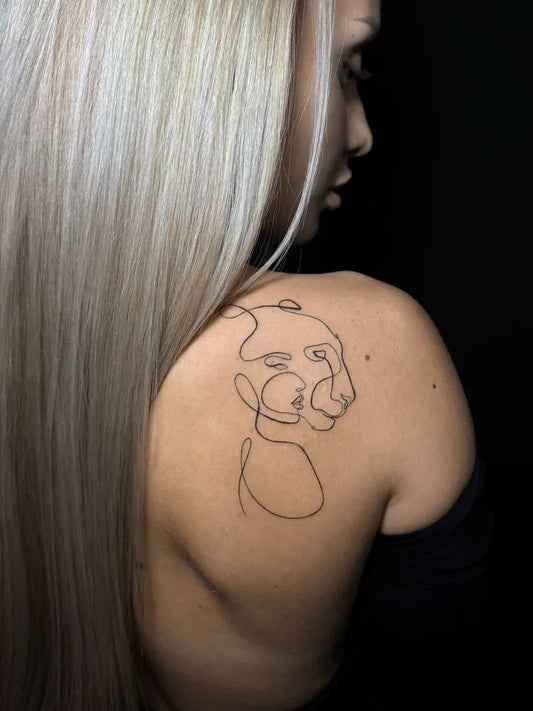 Small Line Art Woman Face and Tiger on Women Back Tattoo by @marinatasseva