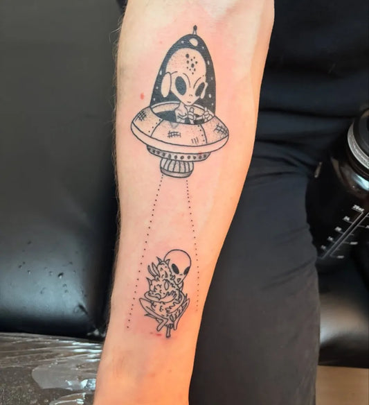 Small Linework Alien UFO Tattoo on Men Arm by @tattoosbyelii