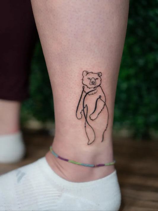 Small Linework Bear on Women Ankle Tattoo by @hollyh_tattoo