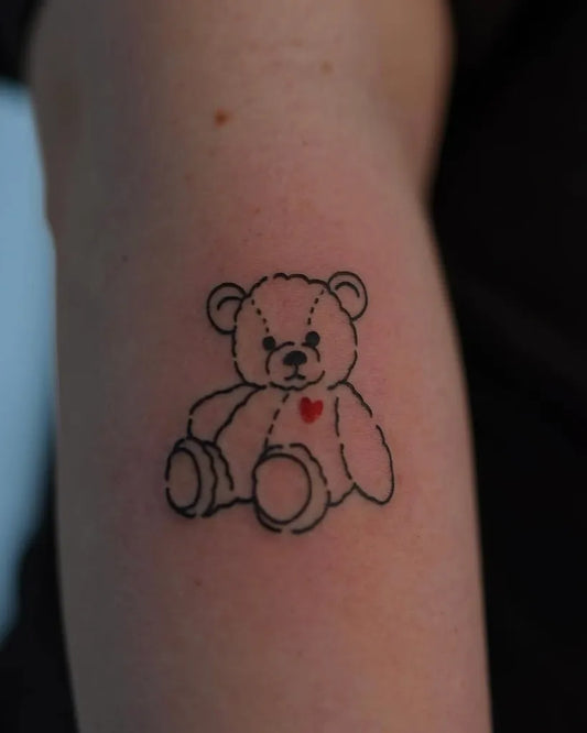 Small Linework Bear with Heart on Women Arm Tattoo by @naro.tattooer