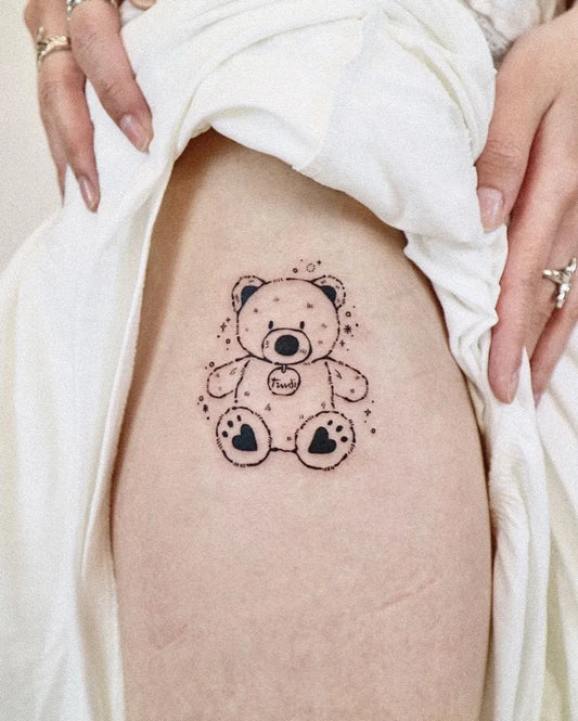Small Linework Bear with hearts and stars on Women Thigh Tattoo by @geeumtattoo