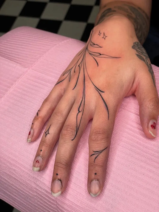Small Linework Branches and Stars on Women Fingers Tattoo by @chxrlieseye.ttt