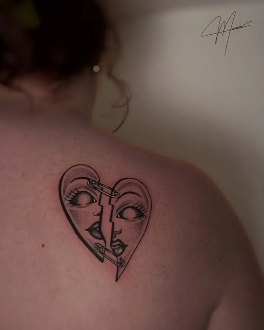 Small Linework Broken Heart Faces on Women Shoulder Tattoo by @manrose.ink