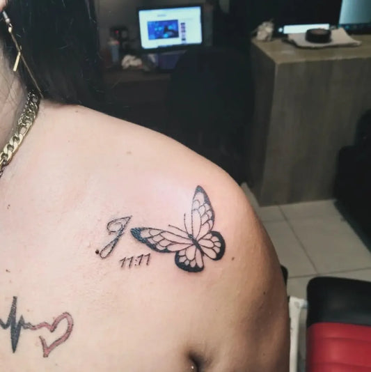 Small Linework Butterfly 1111 on Women Shoulder Tattoo by @tatuajesculiacan