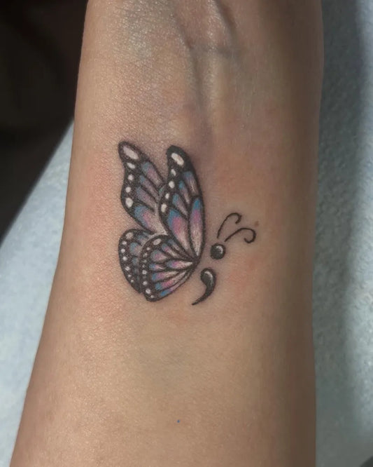 Small Linework Butterfly Semicolon on Women Wrist Tattoo by @deefrost_design