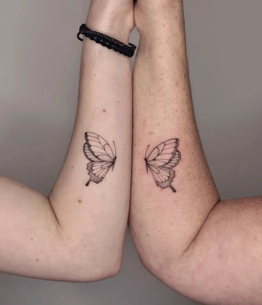 Small Linework Butterfly on Friends Arms Matching Tattoo by @myracle_tattoo