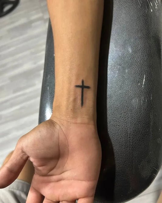 Small Linework Cross on Men Wrist Tattoo by @justine_rodrigueza